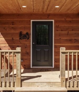 Wooden front porch entrance for blueridge mountain cabin rentals