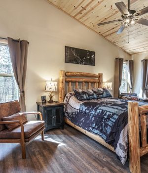 Comfortable bedroom with TV for a relaxing Mountain Getaway