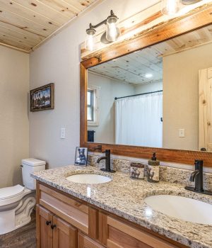 Rustic bathroom vanity inside a comfortable Cabin Rental