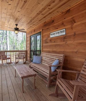 Wooden porch sitting area for blueridge mountain rentals